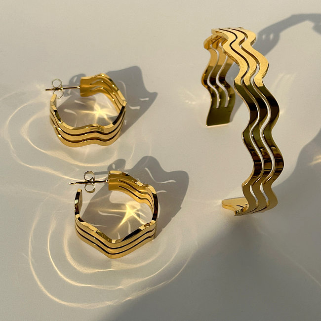 Boucles d'oreilles bracelets en acier inoxydable plaqué or 18 carats avec vagues de style simple de style IG