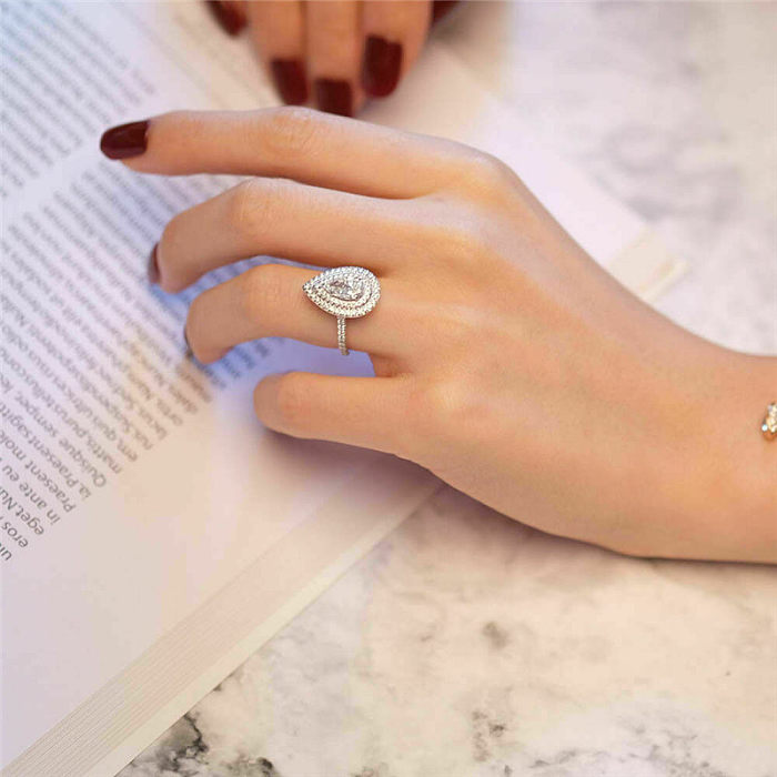 Nuevo Anillo de gota de agua, anillo de cobre de simulación en forma de pera brillante para mujer,