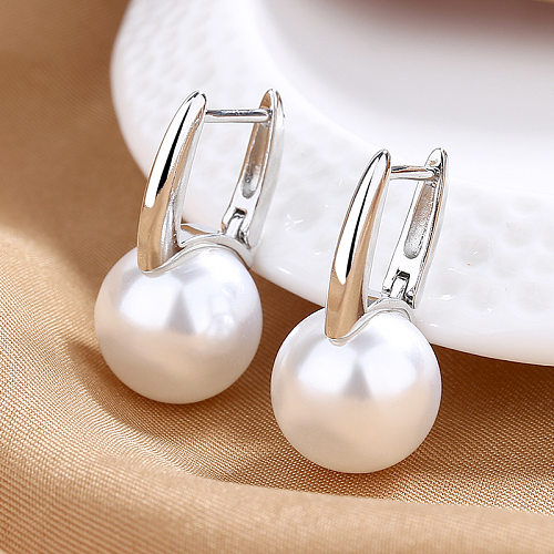 1 par de pendientes de perlas artificiales con incrustaciones de cobre geométricas de moda
