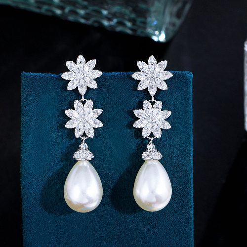 1 par de pendientes colgantes chapados en plata con forma de copo de nieve, perlas artificiales de cobre con incrustaciones de diamantes artificiales