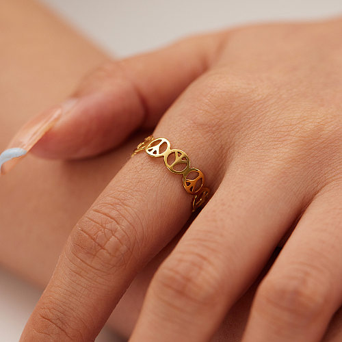 O chapeamento de aço inoxidável geométrico da cor sólida do estilo simples escava anéis abertos banhados a ouro 18K