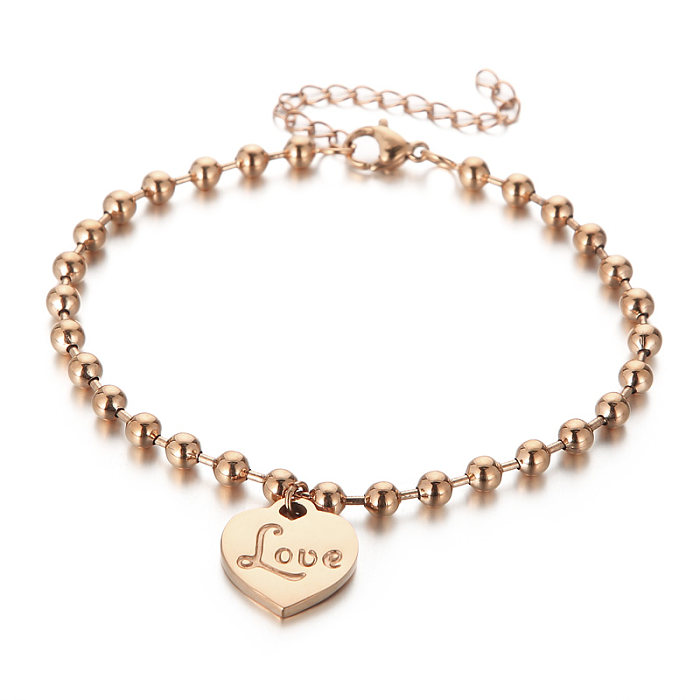 Collier de bracelets de placage en acier titane en forme de coeur d'amour brillant de style simple