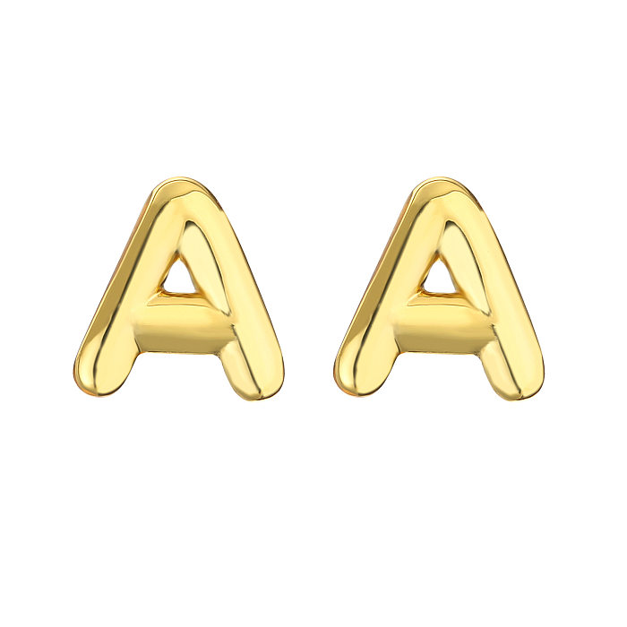 1 par de pendientes chapados en oro de 18 quilates con letras de estilo simple