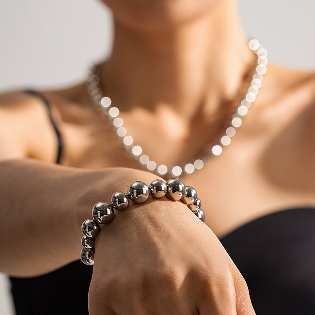 Collier de bracelets de perles en acier inoxydable de couleur unie rétro élégant