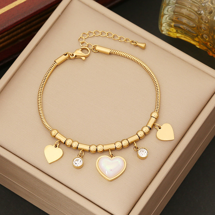 Elegante formato de coração chapeamento de aço inoxidável incrustado pulseiras brincos colar