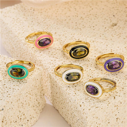 Elegantes anillos de circón con incrustaciones de esmalte de cobre ovalado retro