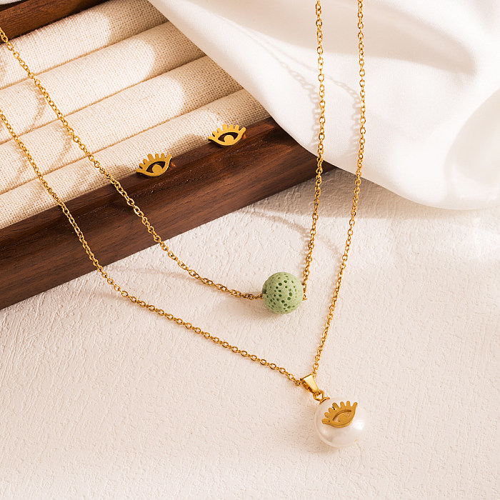 Elegante Herzform-Schlüssel-Edelstahl-Perlenbeschichtung mit vergoldeten Ohrringen und Halskette