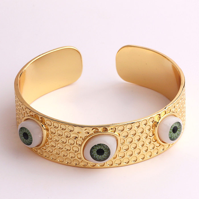Streetwear Devil's Eye Manschettenarmbänder aus Kunststoff mit Kupferbeschichtung
