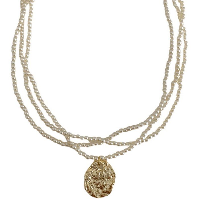 Collier plaqué cuivre avec perles d'imitation rondes douces