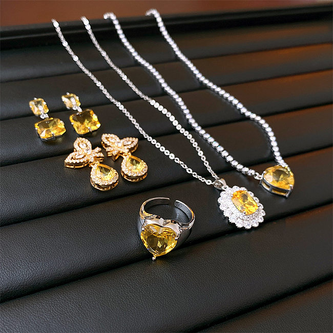 Elegante Schmetterlings-Verkupferungs-Inlay-Zirkon-Ringe-Ohrringe-Halskette