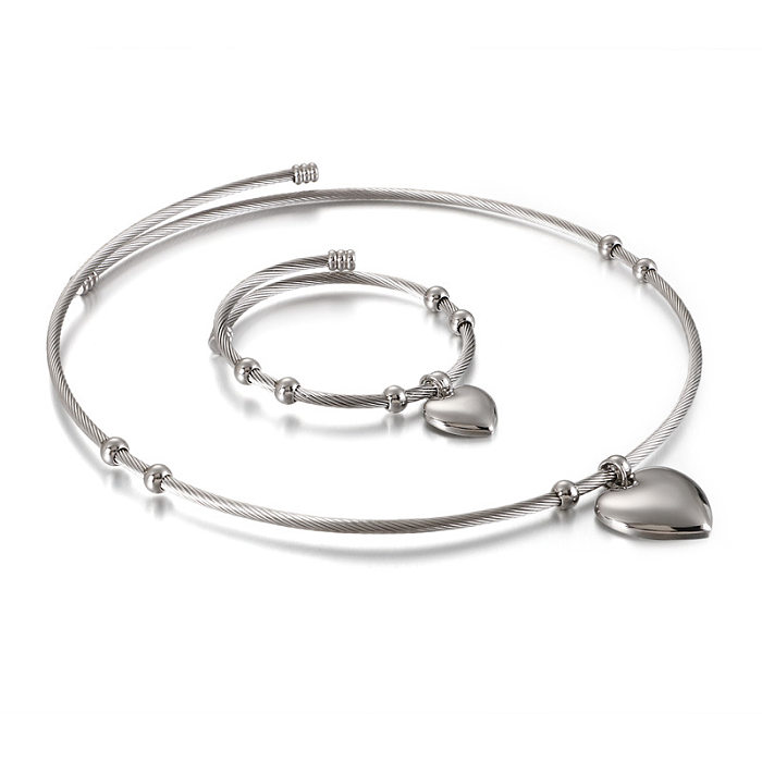 Nova moda aço inoxidável em forma de coração pulseira aberta conjunto de duas peças jóias por atacado