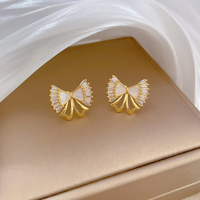 Boucles d'oreilles avec nœud papillon et acier titane, Style moderne et élégant, incrustation de pierres précieuses artificielles, collier