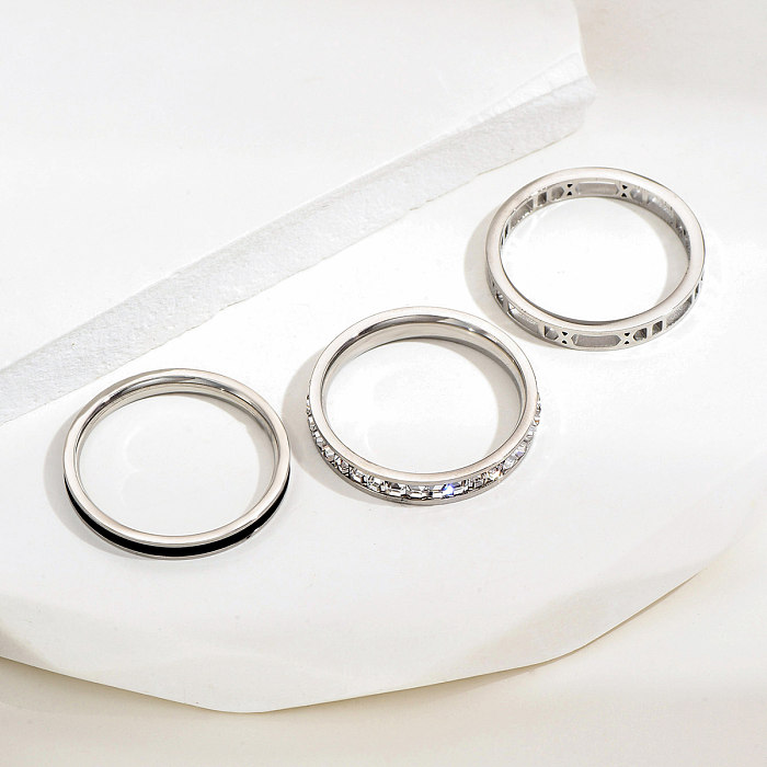 Juego de 3 piezas de anillos de diamantes de imitación con incrustaciones huecas esmaltadas de acero inoxidable circulares de estilo simple