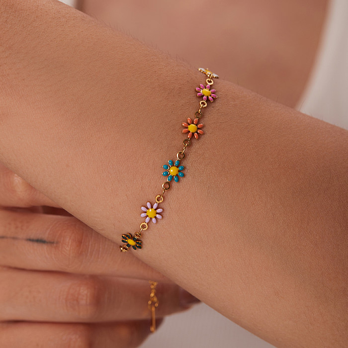 Collier de bracelets plaqués or en acier inoxydable à fleurs à la mode