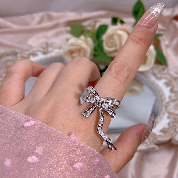 Anéis abertos básicos de zircão com embutimento de cobre com nó de flor em forma de coração