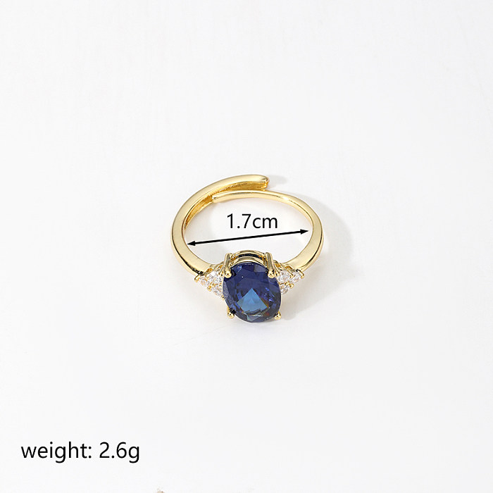 O estilo simples comuta anéis abertos do zircão do embutimento do cobre da cor sólida