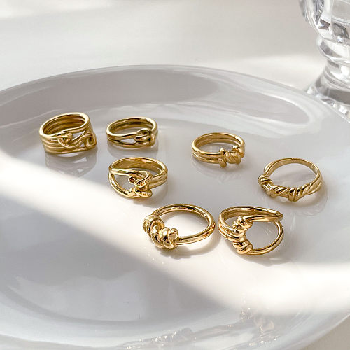 Anéis chapeados ouro de aço Titanium da cor sólida do estilo simples no volume