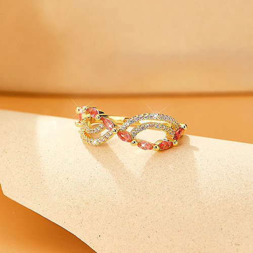 Anéis de zircão com incrustações de cobre com asas de estilo moderno e elegante