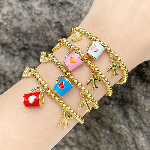 Pulseras de circón con incrustaciones de cobre con forma de avión con forma de corazón y taza dulce a la moda estilo IG