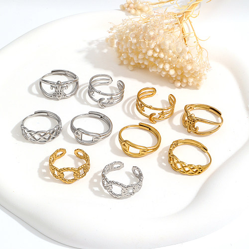 Le placage en acier inoxydable de couleur unie de style simple et décontracté évide les anneaux ouverts plaqués or 18 carats