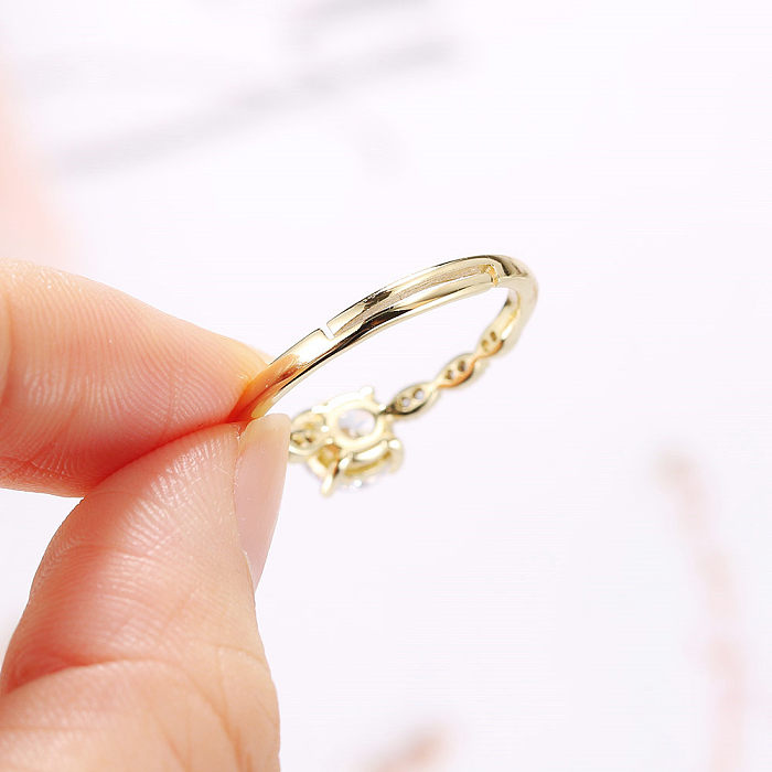 Anéis abertos de zircão com embutimento de cobre redondo feminino