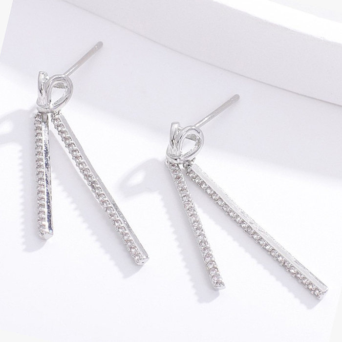 1 par de pendientes chapados en oro blanco con incrustaciones de cobre y circonita de Color sólido dulce