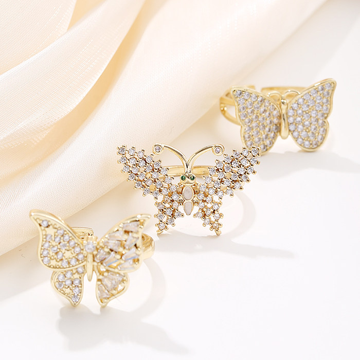 Elegante streetwear borboleta cobre strass embutidos anéis abertos