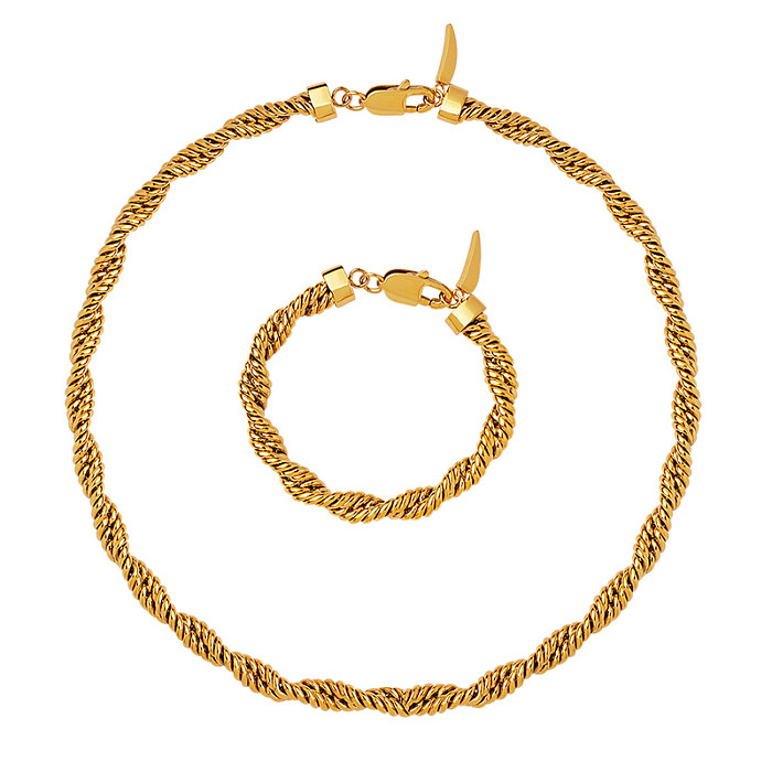 Schlichte, gedrehte Halskette mit vergoldeten Armbändern aus Titanstahl
