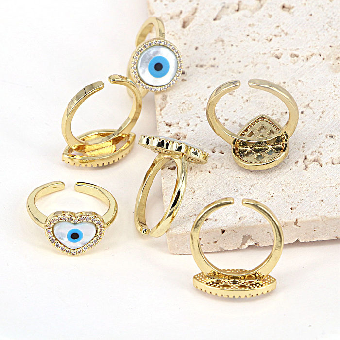 مجوهرات أوروبية وأمريكية على شكل قلب خاتم نحاسي على شكل عين قذيفة هندسية