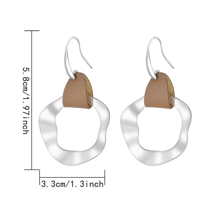 1 paire de boucles d'oreilles rétro en cuir Pu et cuivre, placage irrégulier