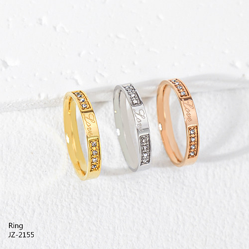 Großhandel Ringe im lässigen klassischen Stil mit Buchstaben-Edelstahl-Inlay, rosévergoldet, vergoldet, versilbert, mit Strasssteinen