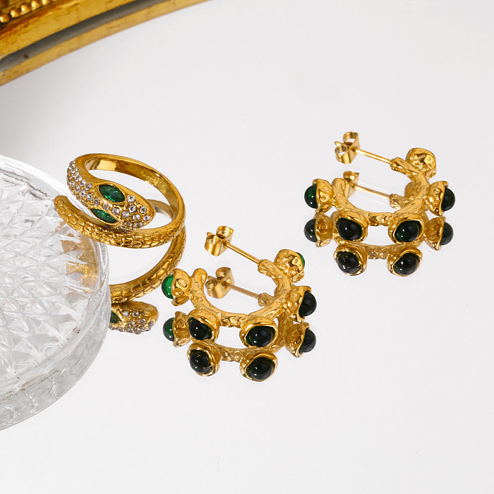Pendientes de anillos chapados en oro de 18 quilates con incrustaciones de acero inoxidable y serpiente retro