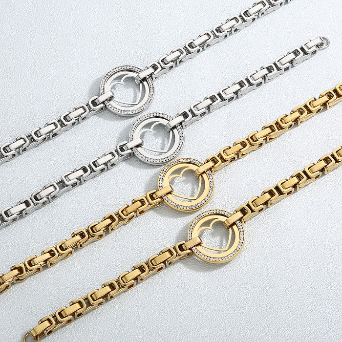 Collier élégant de bracelets de diamant artificiel d'incrustation d'acier de titane de forme de coeur rond élégant