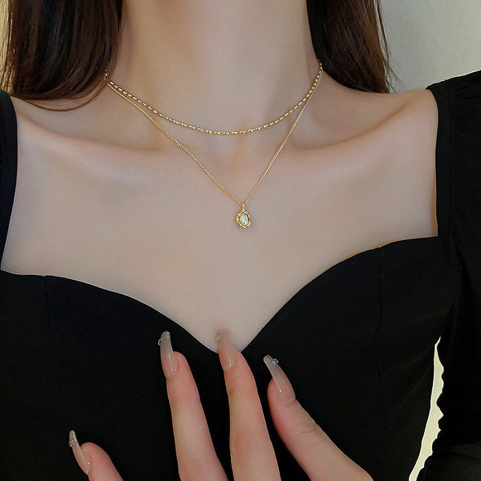 Collier avec pendentif en perles géométriques irrégulières, Style moderne, en cuivre plaqué or et argent, en vrac