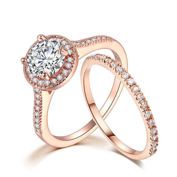 Anéis elegantes redondos de cobre com incrustações de zircão