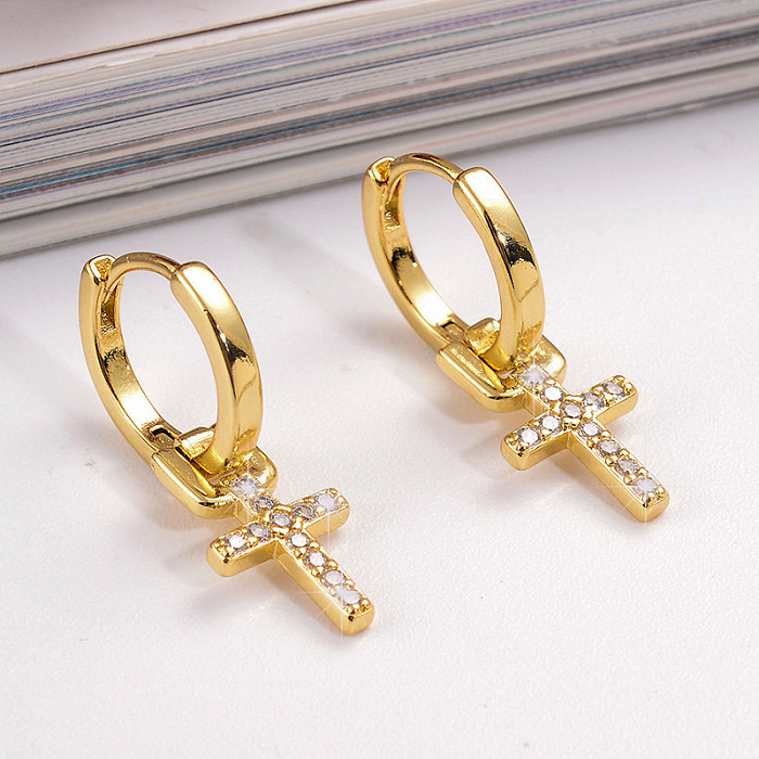 1 Paar Streetwear-Kreuz-Teufelsauge-Ohrringe mit Inlay aus Kupfer und Zirkon