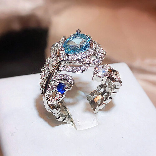 Elegante, glamouröse offene Ringe mit Feder-Messing-Intarsien und Zirkon