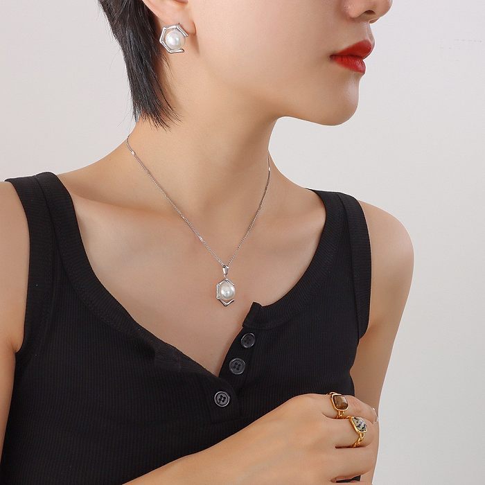 Moda geométrica con incrustaciones de perlas de imitación colgante de acero de titanio pendientes collar conjunto de joyas