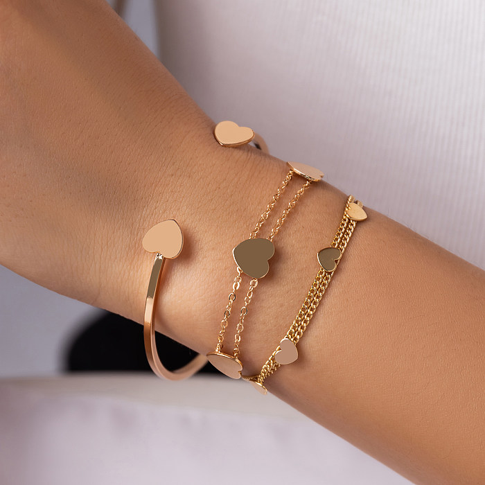 Estilo simples estilo clássico comute pulseiras de chapeamento de cobre em forma de coração