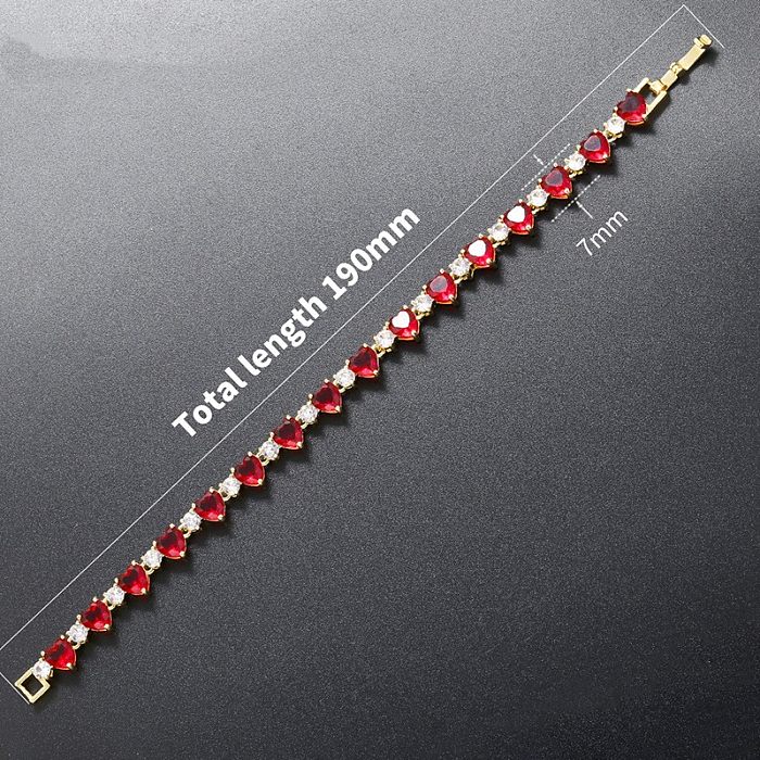 Elegante, glänzende, herzförmige Verkupferungs-Inlay-Zirkon-18-Karat-vergoldete Damen-Armband-Halskette