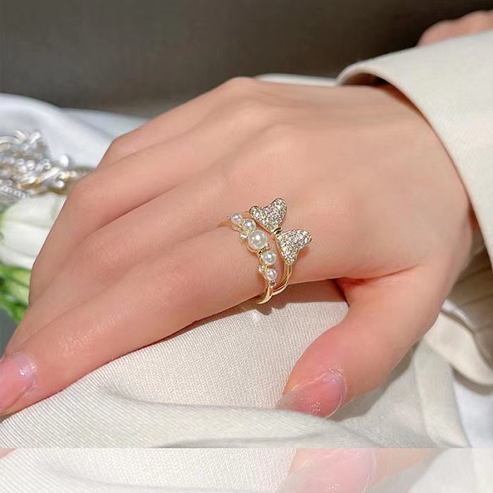 Sweet Simple Style Bow Knot Copper Plating Inlay Pearl Zircon Open Ring