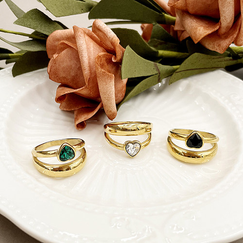 Anéis folheados a ouro de aço inoxidável elegantes do zircão da forma do coração do estilo simples no volume