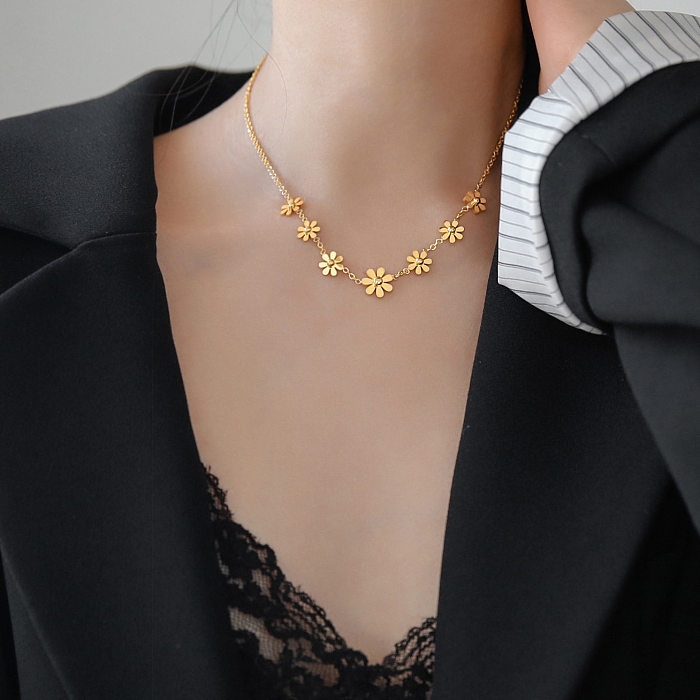 Collar de tobillera chapado en oro con revestimiento de acero de titanio y flor de color sólido de estilo simple