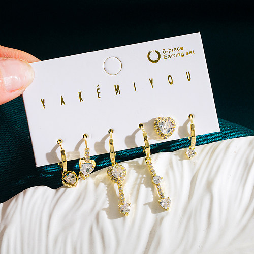 1 conjunto Yakemiyou brincos de gota banhados a ouro 14K em formato de coração com revestimento de cobre e zircônia