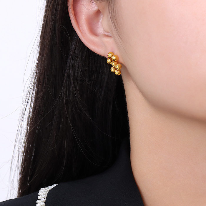 Europäische und amerikanische Titanstahl-plattierte 18-Karat-Gold-Stahlfarben-Halsketten-Ohrringe