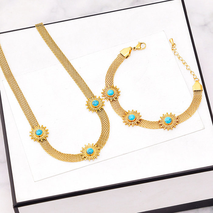 Klassischer Stil mit Blumen-Titanstahl-Beschichtung, türkisfarbenen Armbändern, Ohrringen und Halsketten