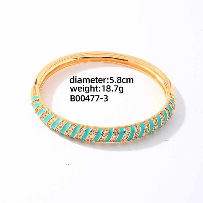 Elegante Damen-Armbänder mit geometrischen runden spiralförmigen Streifen, Kupfer-Emaille-Beschichtung, Inlay, Zirkon, vergoldete Ringe