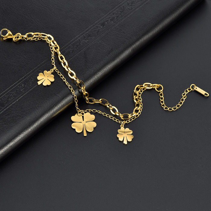 Tobillera de pulseras chapadas en oro de 18K con revestimiento de acero de titanio y trébol dulce lindo de cuatro hojas