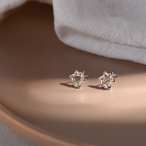 1 paire de clous d'oreilles plaqués cuivre en forme d'étoile de style simple