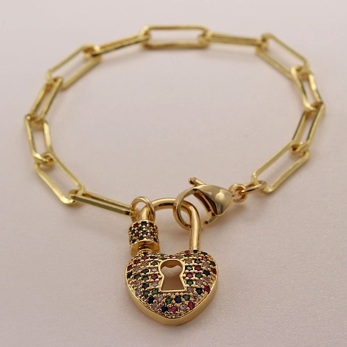 Collier de bracelets plaqués or de zircon d'incrustation de placage de cuivre de serrure de forme de coeur de style moderne